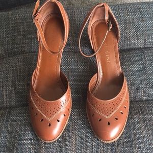 Light brown genuine leather heels.